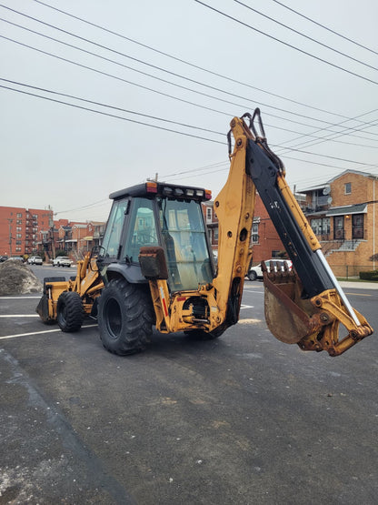 1987 Case 580K 4 x 4 Loader Backhoe w/Extendahoe