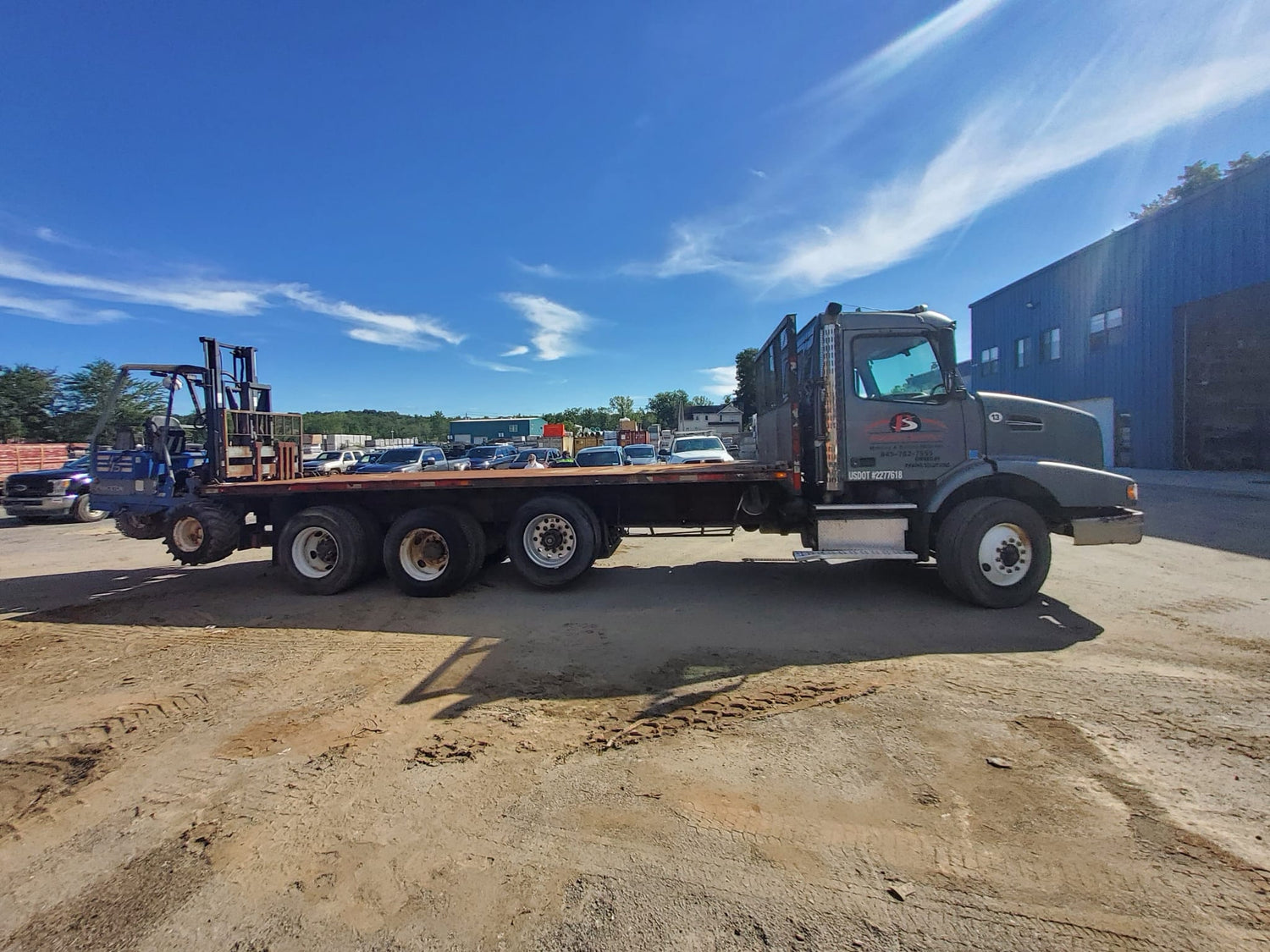 2004 Volvo VHD Flatbed with Princeton PB50 Truck Mounted Forklift